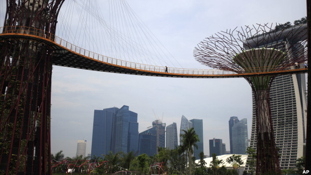 A man walks across the OCBC Skyway in Singapore