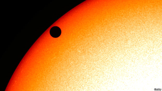 Venus crossing the face of the sun