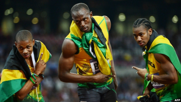 Usain Bolt celebrates with Jamaica
